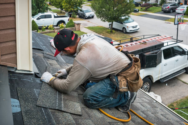 Professional Roof Replacement technician working in Devers, TX